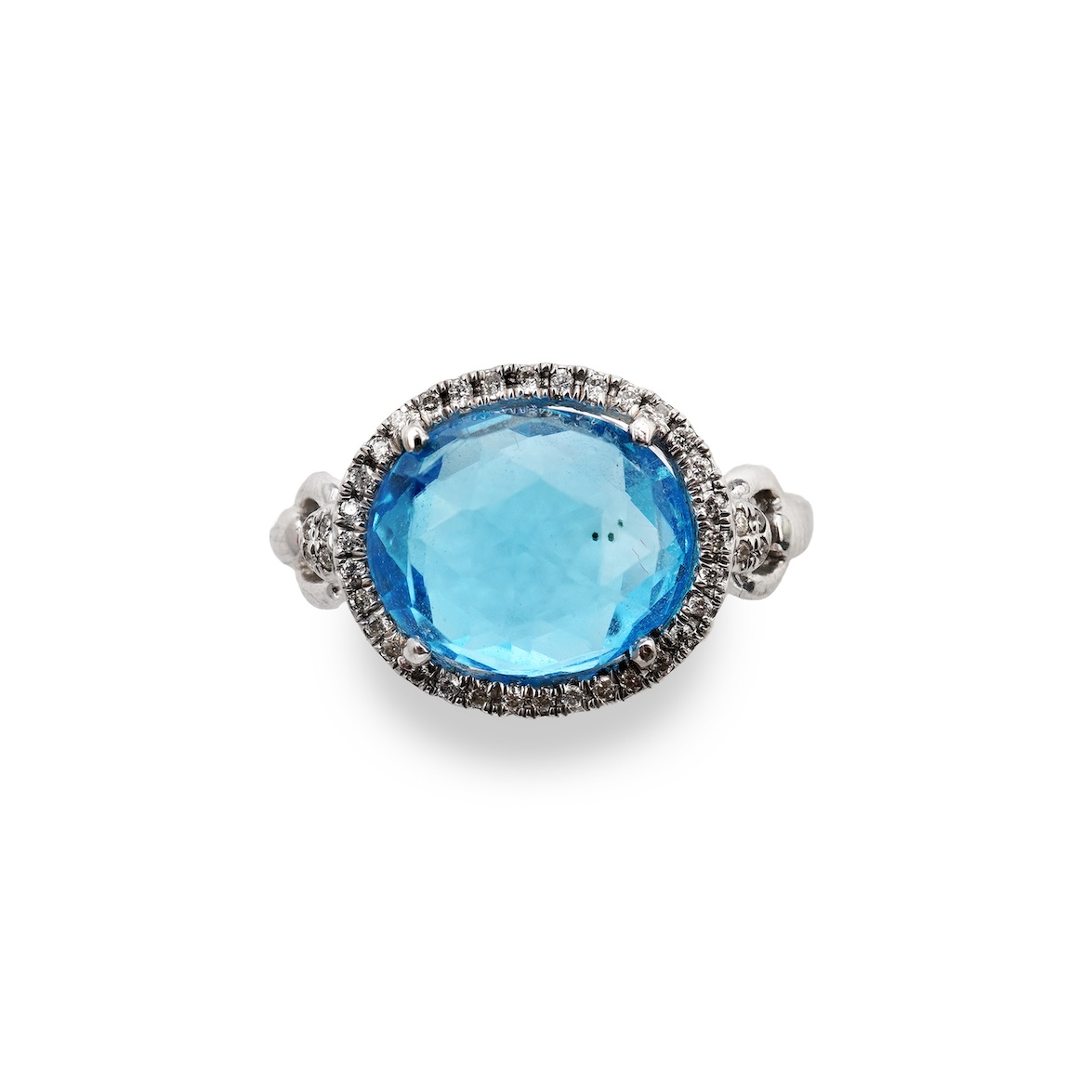 A blue topaz and diamond ring